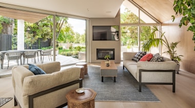 The rich timber ply ceiling returns from the 