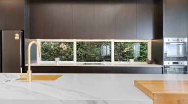 The window splashback brings more natural light onto 