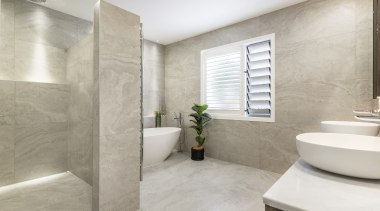 A shower partition wall was added to avoid 