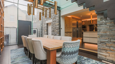 The kitchen is open to the light-filled dining 