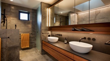 A nib wall provides showering privacy. - Warm, 