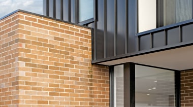 Existing bricks running one way, standing seam metal apartment, architecture, blue, brick, brickwork, building, daylighting, daytime, facade, glass, home, house, line, material property, property, real estate, residential area, siding, sky, wall, window