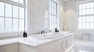 ​​​​​​​All the elements that make up this ensuite architecture, bathroom, bathroom accessory, bathtub, floor, flooring, furniture, plumbing fixture, sink, tap, tile, white, ingrid geldof design