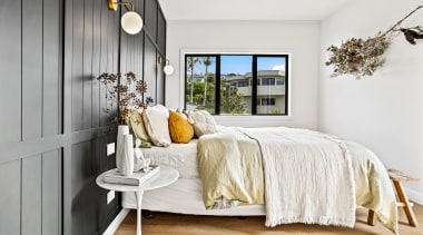 The guest bedroom with panelled wall. - Where 
