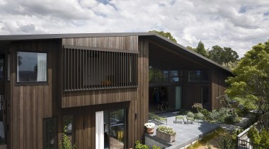 The north-east facade showing garden room. - How 