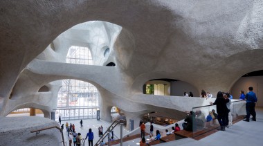 Akin to a porous geologic formation shaped by 