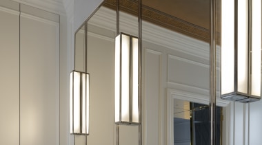 Wall panels conceal storage for a seamless look. 