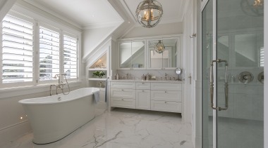 Marble-look tile floors add to the classic aesthetic. 