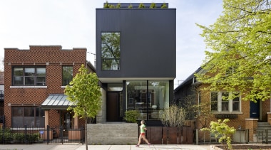 While the footprint is modest the home rises 