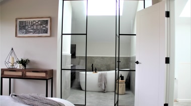 With careful planning around a slopping ceiling, this 