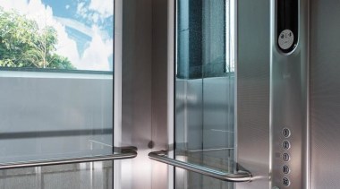 Below far left Kone Elevators supplied and installed gray, black