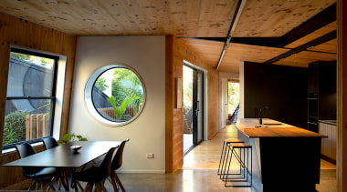 CLT walls allow the structure to create striking brown, black