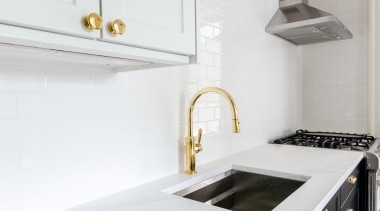 Kitchen sink with brass tap -  