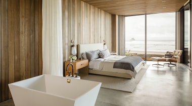 Muted tones in master ensuite reflect the surrounding architecture, bed, bed frame, ceiling, floor, flooring, furniture, interior design, mattress, room, suite, wood, gray, brown