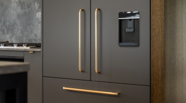 An ice dispenser gives away the integrated fridge's 