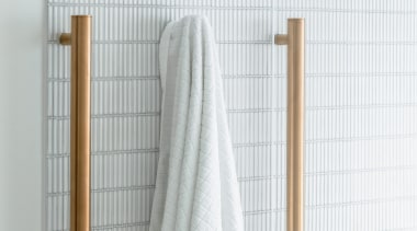 Vertical towel rails in reflection. - Light, white 