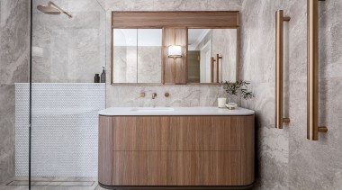 Vertical towel rails add a contemporary accent. 