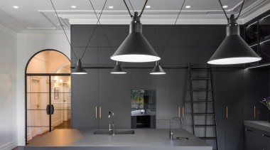 This contemporary, industrial kitchen renovation transformed the space 