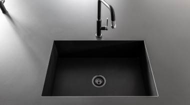 The flush sink contributes to the modern vibe. 