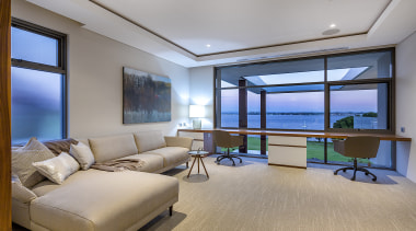 This living space/study in an upmarket Perth home apartment, architecture, building, ceiling, floor, furniture, home, house, interior design, lighting, living room, loft, property, real estate, room, table, wall, window, gray