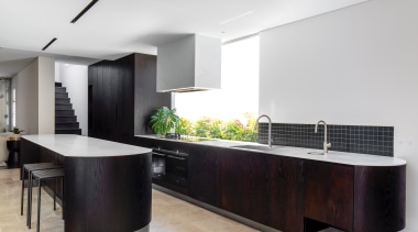 The kitchen benefits from individualistic details and materials 