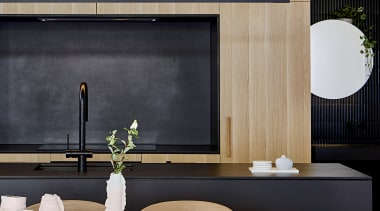 The monolithic-slab island is detailed to enhance the 