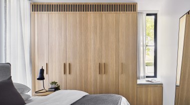 The master bedroom complete with storage that echoes 