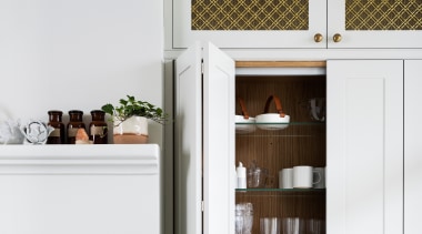 Mesh cabinet door inserts are in keeping with 