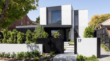 The exterior showcases a dynamic facade of stepped 