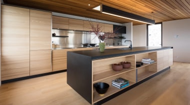 ​​​​​​​Part of the calm, restful appeal of this architecture, cabinetry, countertop, cuisine classique, floor, flooring, hardwood, house, interior design, kitchen, real estate, wood, wood flooring, brown, open shelving, shelving