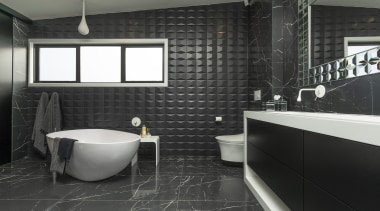Given a large space for this master bathroom, black, countertop, floor, flooring, interior design, room, tile, wall, black