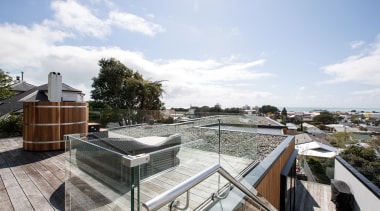 Soaking in the views – a  rooftop spa home, house, outdoor structure, property, real estate, roof, water, white