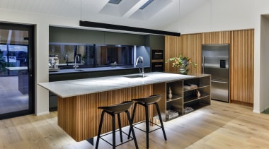 This entertainer’s kitchen by Fyfe Kitchens designer Kira countertop, floor, flooring, interior design, kitchen, real estate, gray