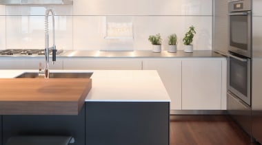 ​​​​​​​Subtle lighting can make all the difference. For architecture, cabinetry, countertop, flooring, hardwood, interior design, kitchen, laminate flooring, sink, wood flooring, white, William Landeros,  Kitchen Distributors