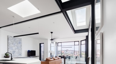 Niche handles on the island cabinetry continue this architecture, home, house, interior design, loft, window, gray, white, furniture, cabinetry, Biji Architects, timber floor, skylights