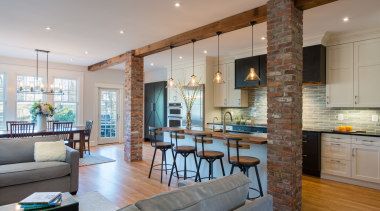 ​​​​​​​With a wall between the living zone and home, interior design, living room, furniture, timber floor, tradtional