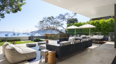 ​​​​​​​Extend your living area to the outdoors to architecture, home, house, outdoor patio, outdoor furniture, umbrella, SAOTA