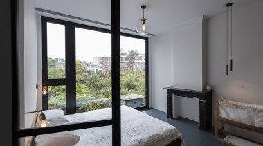 ​​​​​​​Cantero Architecture’s renovation of the first floor of architecture, bed, bedroom, bedroom, door, floor, furniture, hardwood, home, house, interior design, Cantero Architects, storeage, 