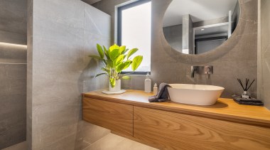 ​​​​​​​This master ensuite includes a window that turns architecture, bathroom, bathroom accessory, bathroom sink, ceramic, floor, flooring, marble, mirror, plumbing fixture, sink, tap, tile, QPC, Yellowfox