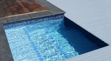 ​​​​​​​Roll Out Roll Under slatted covers are a architecture, composite material, floor, leisure, property, real estate, rectangle, swimming pool, tile, water, water feature, gray