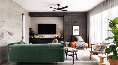 ​​​​​​​A feature cast-in-situ concrete wall with all imperfections architecture, coffee table, comfort, couch, design, floor, flooring, furniture, green, home, house, interior design, living room, passive heating, concrete wall, polished concrete floor, Dalecki Design