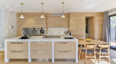 ​​​​​​​Natural-touch oak veneer on the perimeter cabinetry and architecture, cabinetry, countertop, cupboard, home, house, interior design, kitchen, lighting, tile, wood, wood flooring, oak, Matisse