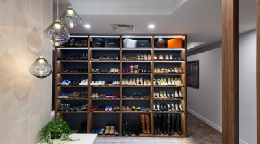 ​​​​​​​Shoe wardrobe one side, master bedroom headboard the architecture, building, display case, footwear, furniture, interior design, property, room, shelf, shelving, shoe, wine rack, gray