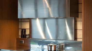 ​​​​​​​From the leathered granite island benchtop to the architecture, building, cabinetry, ceiling, countertop, exhaust hood, floor, flooring, furniture, glass, home, house, interior design, kitchen, light fixture, lighting, material property, metal, property, room, tile, wood, brown
