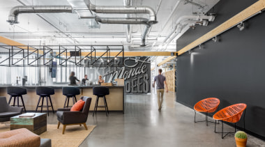 Instead of a formal reception area, a large architecture, building, floor, furniture, interior design, loft, office, room, lounge, Attraction Mediatable, gray
