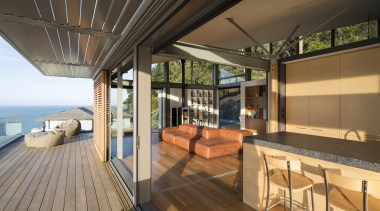 ​​​​​​​Together with the external cedar sliding panels, automatically brown, black