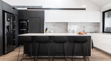 ​​​​​​​This reinvented kitchen is part of a wider white, black