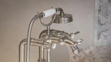 The freestanding stone tub in this bathroom is 