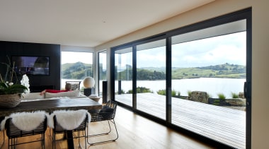 ​​​​​​​A black feature wall behind the television together 