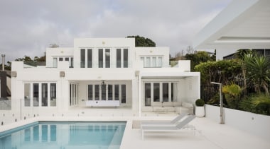 The pool and landscaping reflects a seamless flow 